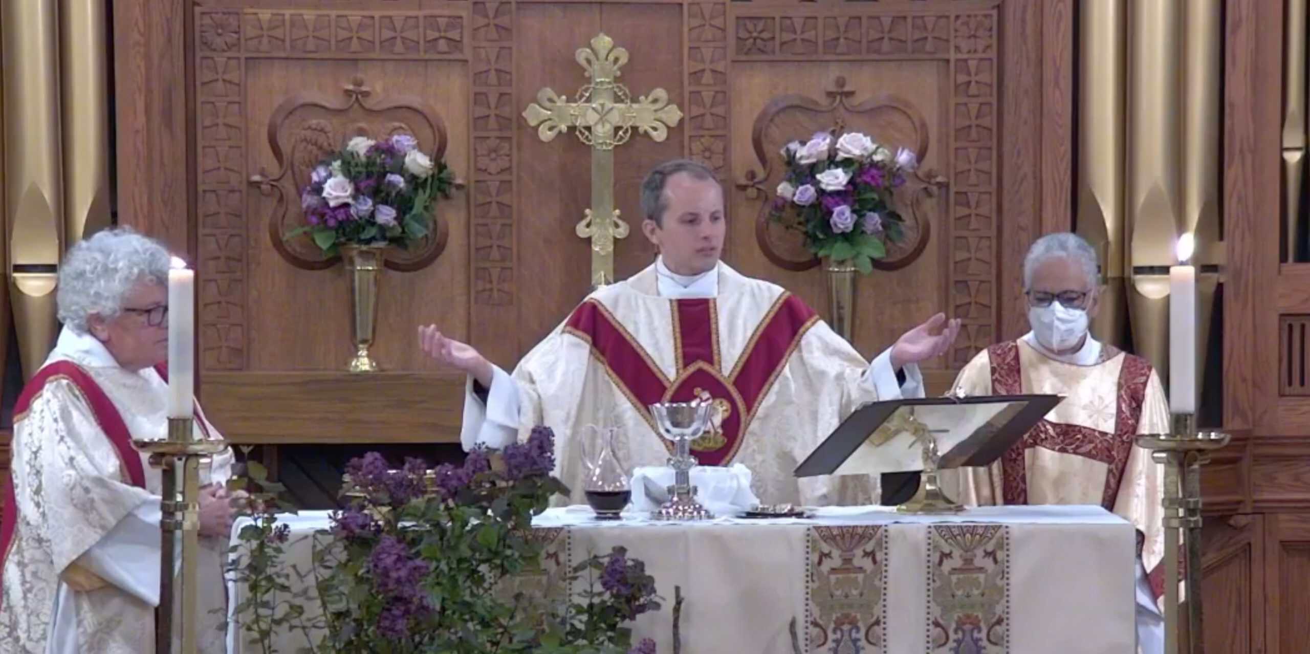 Clergy performing a religious service at the Church of the Incarnation.